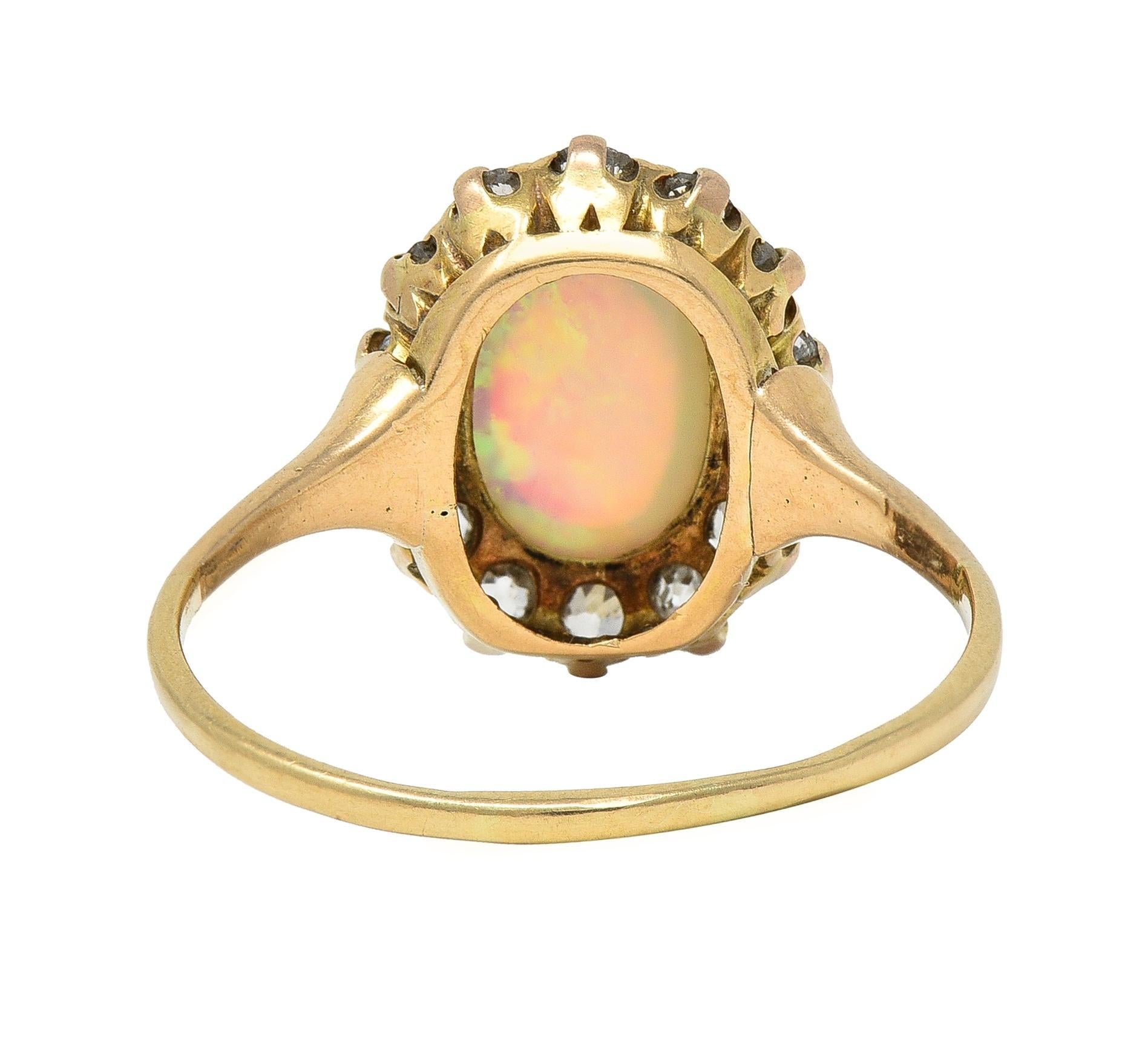 Women's or Men's Victorian 0.86 CTW Opal Cabochon Diamond 14 Karat Yellow Gold Antique Halo Ring For Sale