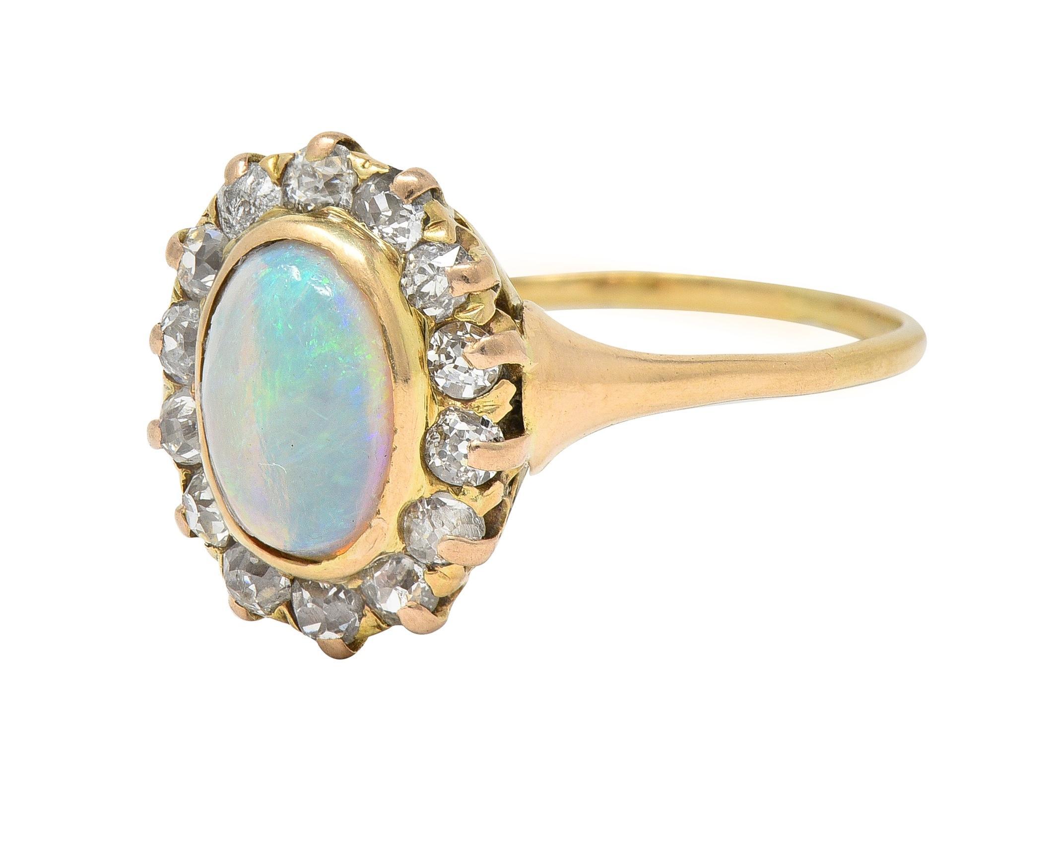 Victorian 0.86 CTW Opal Cabochon Diamond 14 Karat Yellow Gold Antique Halo Ring For Sale 2