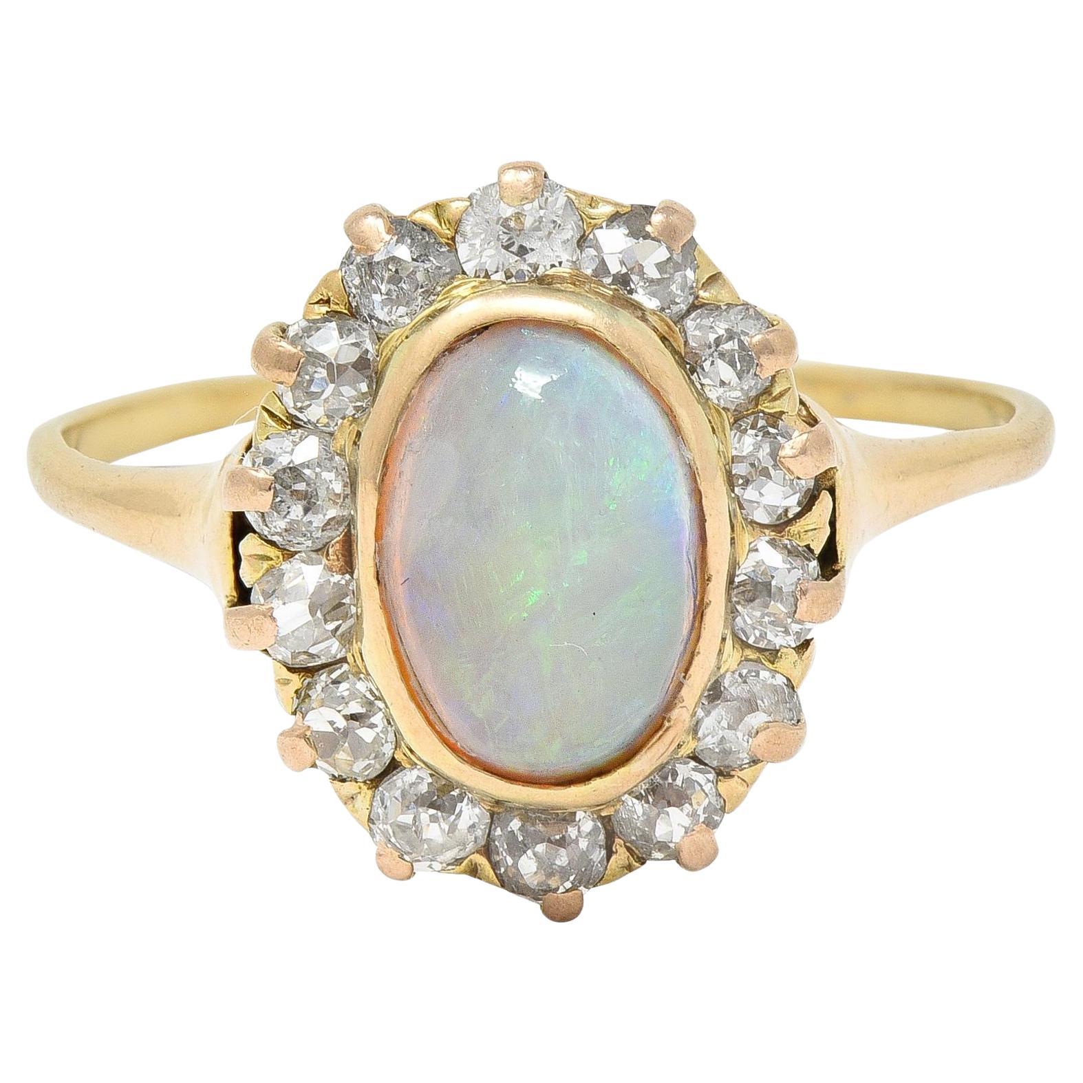 Victorian 0.86 CTW Opal Cabochon Diamond 14 Karat Yellow Gold Antique Halo Ring For Sale