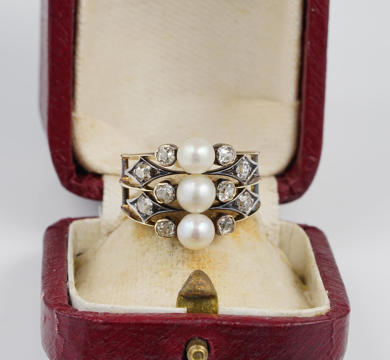 An unique Victorian example, 1870 ca
Very beautiful, fashioned upon three rare Natural not Nucleated Salt Sea Pearls, the trio inspired the whole unique design
1.0 Full carat of old mine cut Diamonds spreading as complement with glowing sparkle to