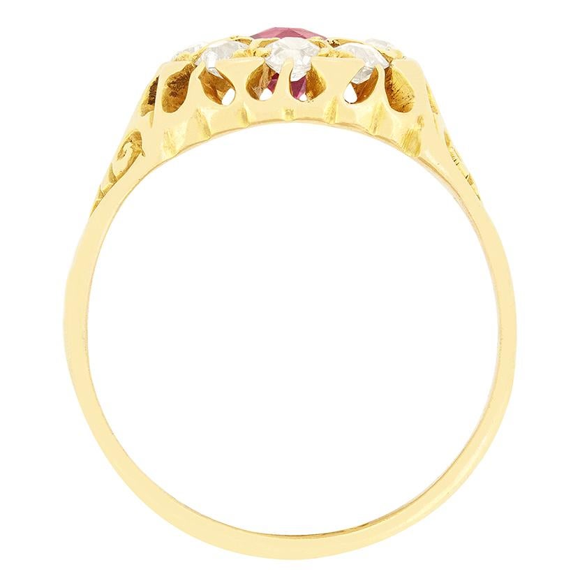 This Victorian cluster ring features hallmarks dating to 1900. At its’s centre sits an old cut ruby, claw set within gold and surrounded by a cluster of old cut diamonds totalling 0.50 carat . The ruby is a natural stone weighing 1.00 carat, whilst