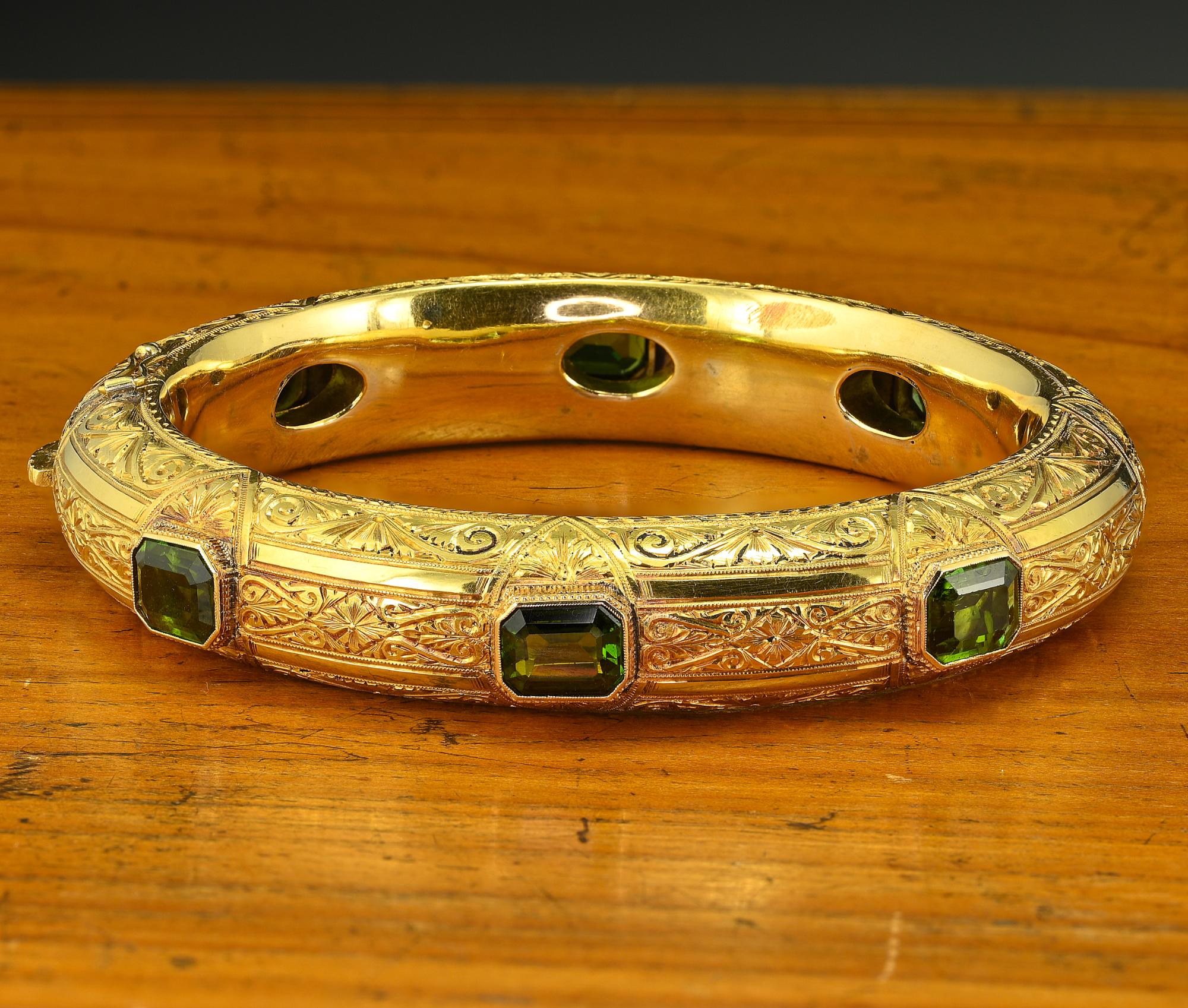 This outstanding antique bangle is Victorian era, 1880 circa
Magnificent workmanship of the era adorned throughout with artful carving making it quite an unique, stamped 18 KT – 41 grams in weight
Set with 6 natural untreated Tourmaline – octagonal