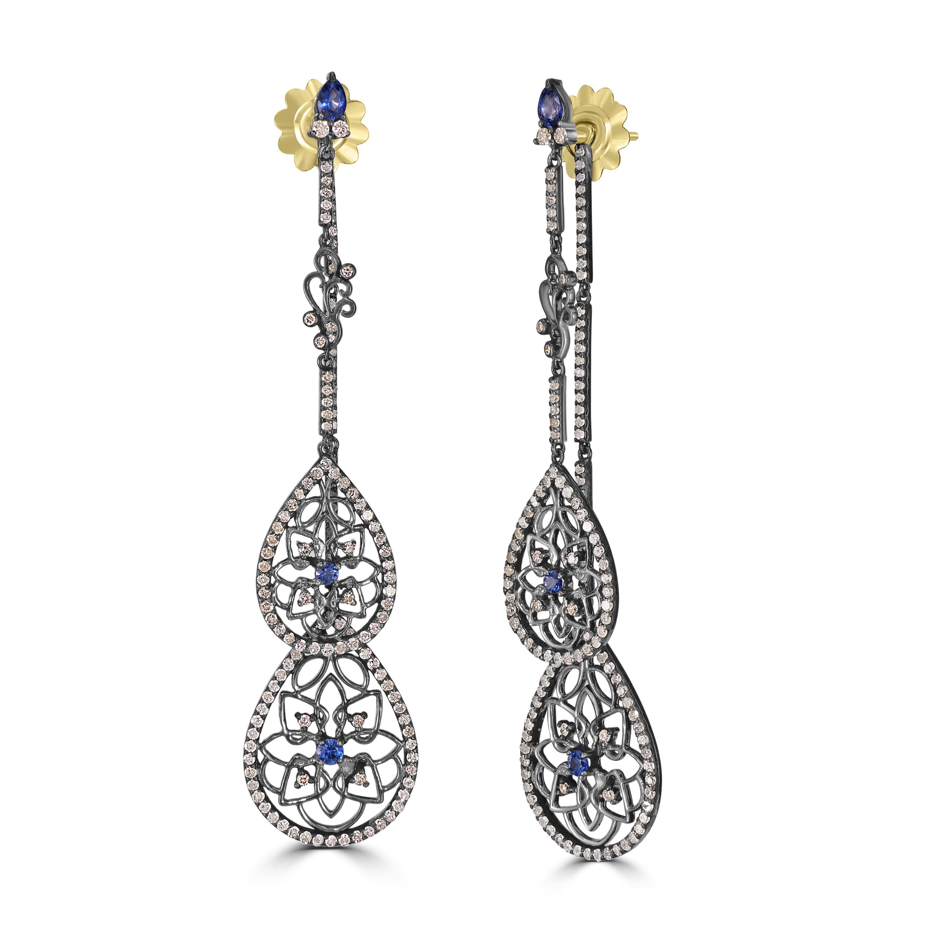 Experience the allure of Victorian elegance with our 10.28 Cttw. Blue Sapphire and Diamond Front Back Double Drop Earrings—an exquisite testament to timeless sophistication and meticulous craftsmanship.

These captivating earrings feature two