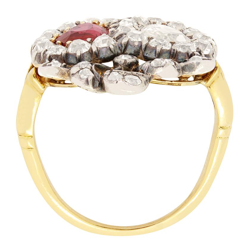 A masterpiece of Victorian craftsmanship, this enchanting double heart ring is a rare truly rare piece. Sitting side by side, the vivid 1.03 carat Burmese ruby sits with fiery intensity, whilst a 0.50 carat old pear cut diamond sparkles wonderfully.