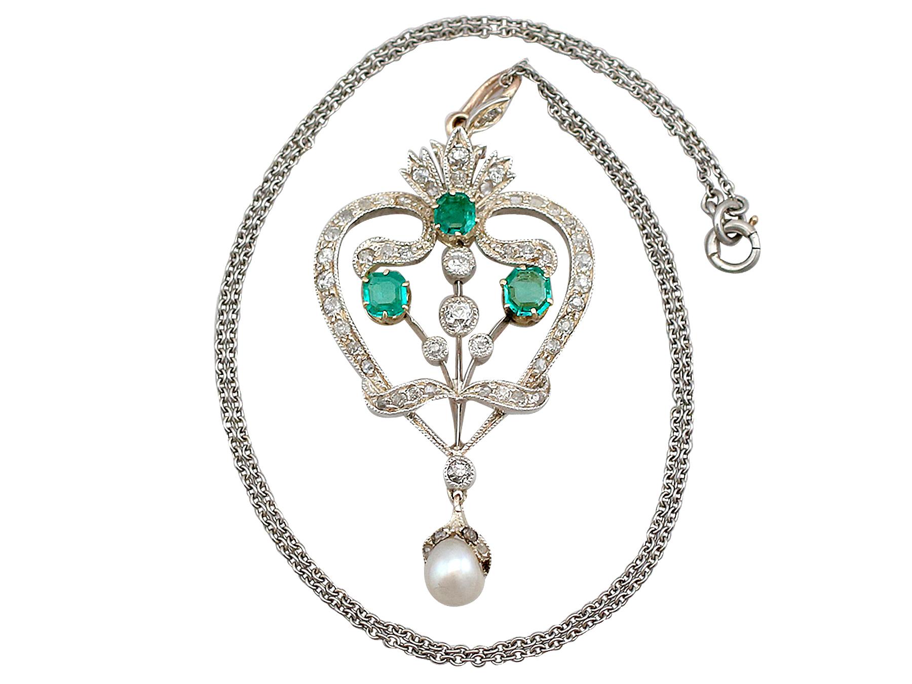 A stunning antique 1.05 carat emerald and 1.04 carat diamond, 9k yellow gold and silver set pendant / brooch with platinum chain; part of our diverse antique jewellery collections.

This stunning, fine and impressive antique emerald and diamond