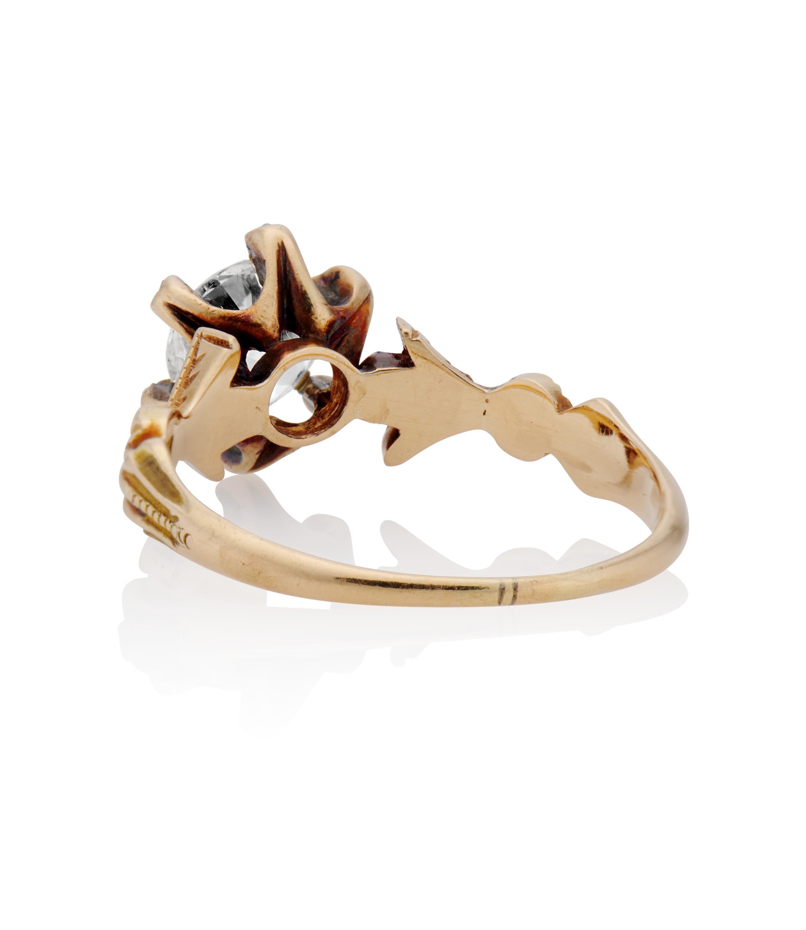 Description 
Antique Victorian engagement ring centered with a GIA Certified 1.06 carat Old European Cut diamond within a carved 18k yellow gold setting. A unique style from the Victorian era with plenty of finger coverage.
Details
GIA certified