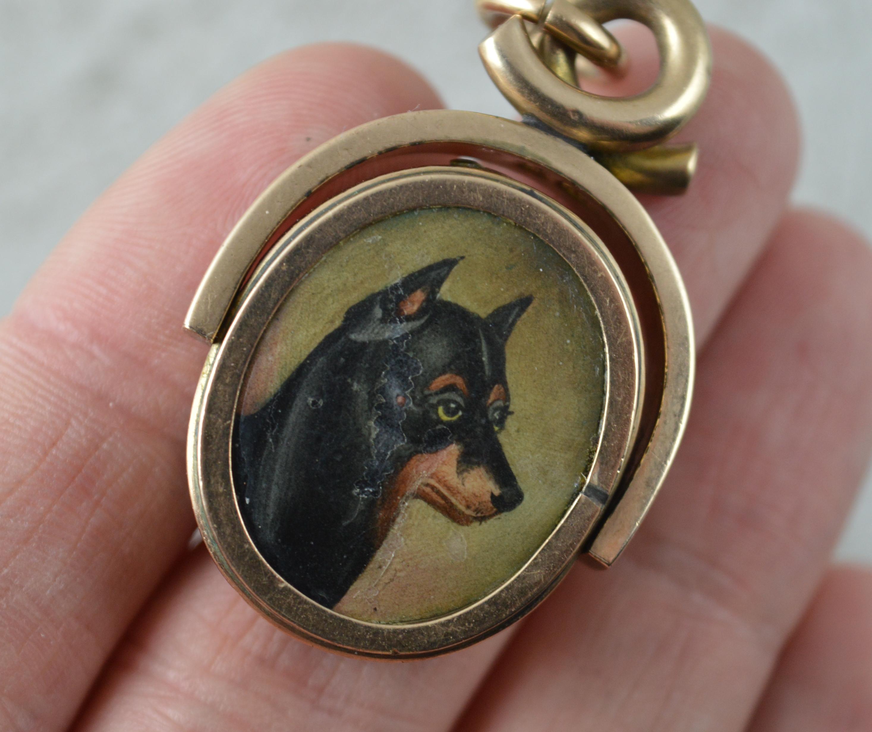 Oval Cut Victorian 10 Carat Rose Gold Painted Dog and Carnelian Swivel Pendant Locket