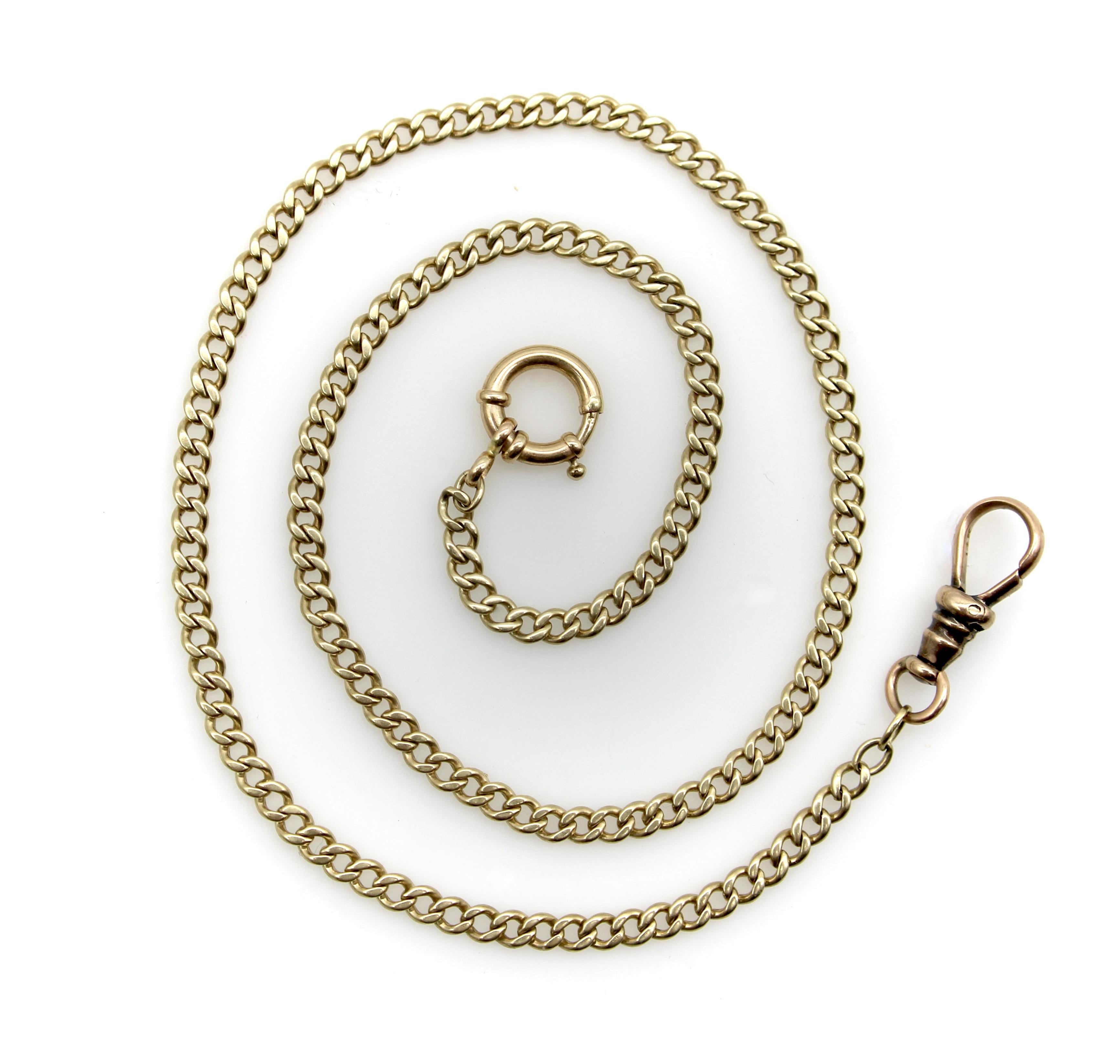 This Victorian 10k gold watch chain is a classic curb link with a dog clip and spring ring. It is a shorter chain, (perfect for a choker) with a thinner width—we love that it is not so heavy, keeping it at a lower price while still giving the