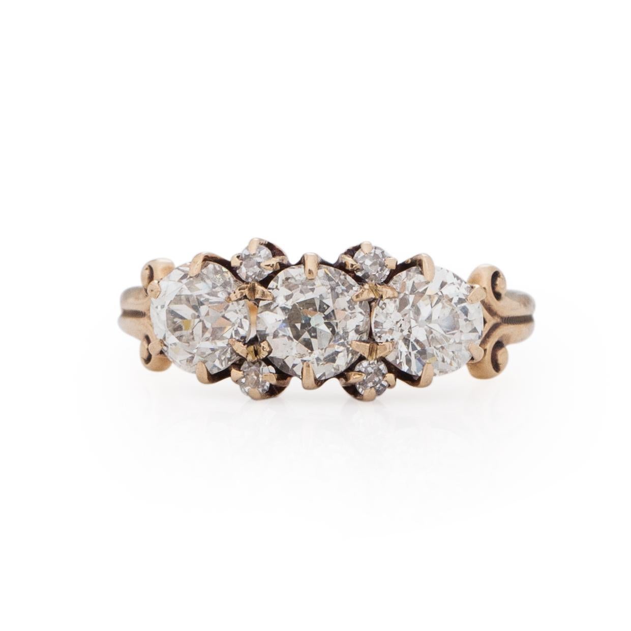 This Victorian beauty is a big look with classic Victorian era details. Crafted in 10K yellow gold with a slight rosey hue. The tapered shanks have a subtle, scroll or column top design that holds a classic prong setting. In those prong settings