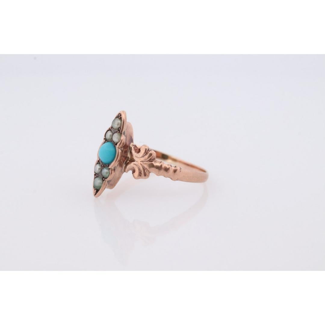 Vintage from the 1900s
Size: 5 1/4 US
Materials: Gold
Gemstone: Turquoise
Gem color: Blue

Style: Minimalist

Beautiful Victorian Ring. Vine top with Turquoise and Pearl seed bezel set into a 10k Flower ornate shank.

Absolutely stunning and