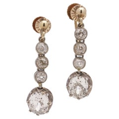 Antique Victorian 11. karat gold pair of screw-back earrings with 3.20 ct diamonds 