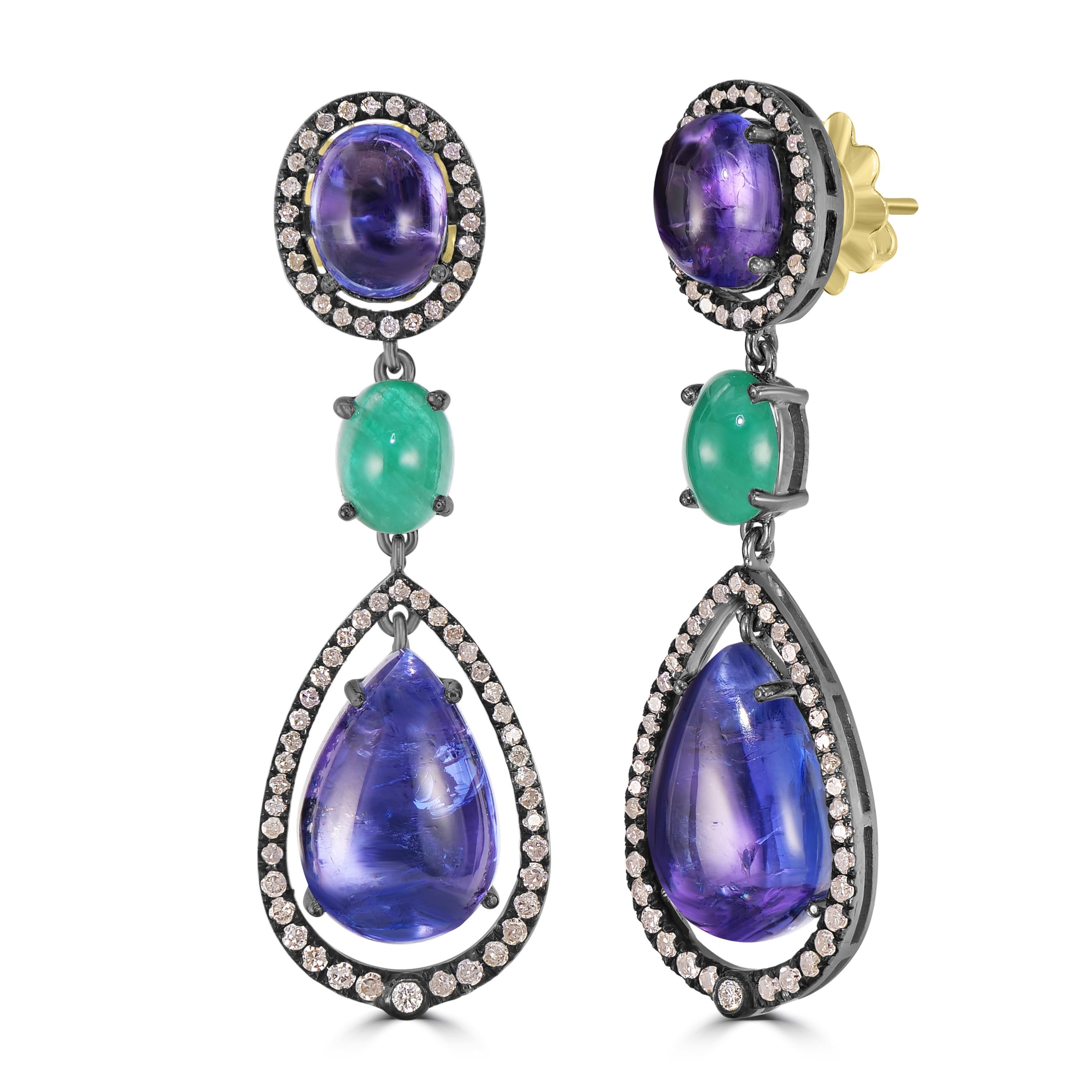Elevate your style with our Victorian 11.03 Cttw. Tanzanite, Emerald, and Diamond Dangle Earrings, a mesmerizing symphony of gemstones and diamonds that seamlessly blend sophistication with timeless charm.

Crafted with precision, these earrings