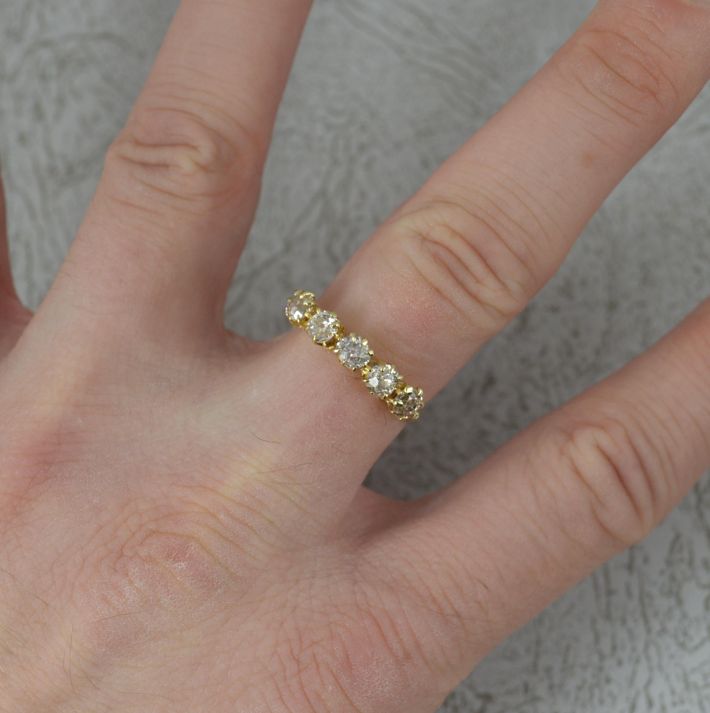 A fine 18 carat gold and diamond five stone ring. c1890.
18 carat yellow gold example.
Designed with five natural old cut diamonds to total 1.10 carats approx.
20mm spread of stones. 4.2mm wide band to front. Protruding 4.3mm off the
