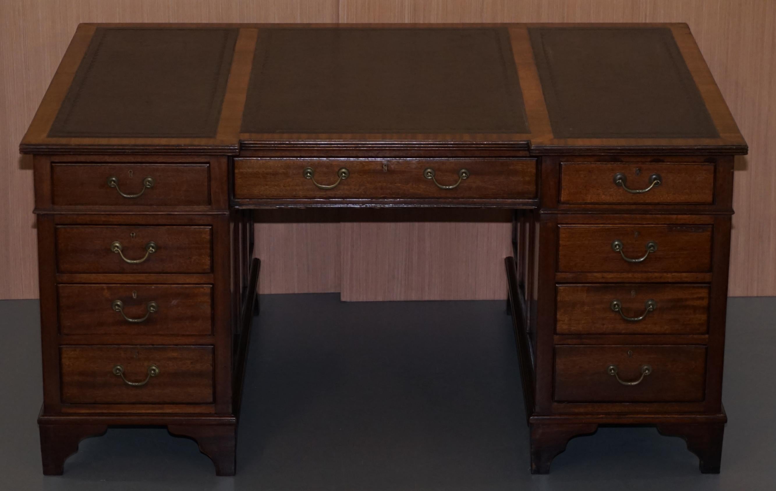 We are delighted to offer for sale this medium sized Victorian twin pedestal 12-drawer 2 cupboards double sided mahogany partner desk with green leather top

This desk is a good medium size, the main side is slightly recessed inside the desk which