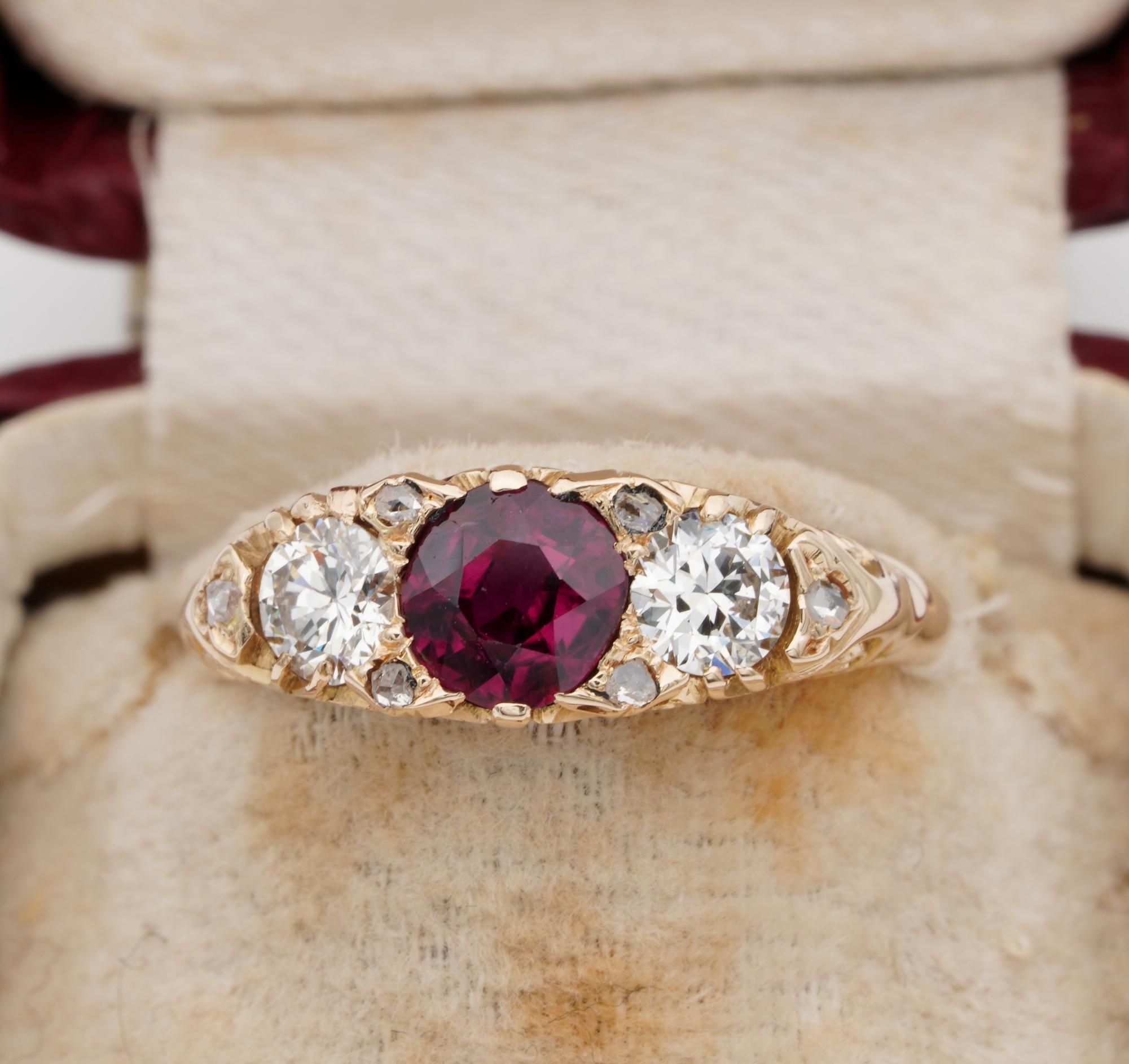 Beautiful antique Victorian period three stone ring, 1890/1900 ca
Lovely half hoop mounting exquisitely hand carved at best refined work of the time – 18 KT solid gold marked
Magnificent quality of Natural Ruby, intense Red, richly saturated, very