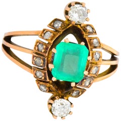 Victorian 1.25 Carats Emerald Diamond 14 Karat Rose Gold Halo Ring