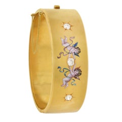 Victorian 1.25 Total Carat 3-Stone Diamond Enameled Cherubs Bangle Bracelet