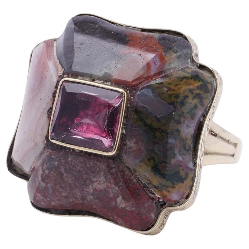 Victorian 12K gold ring featuring Scottish agate and a central pink tourmaline