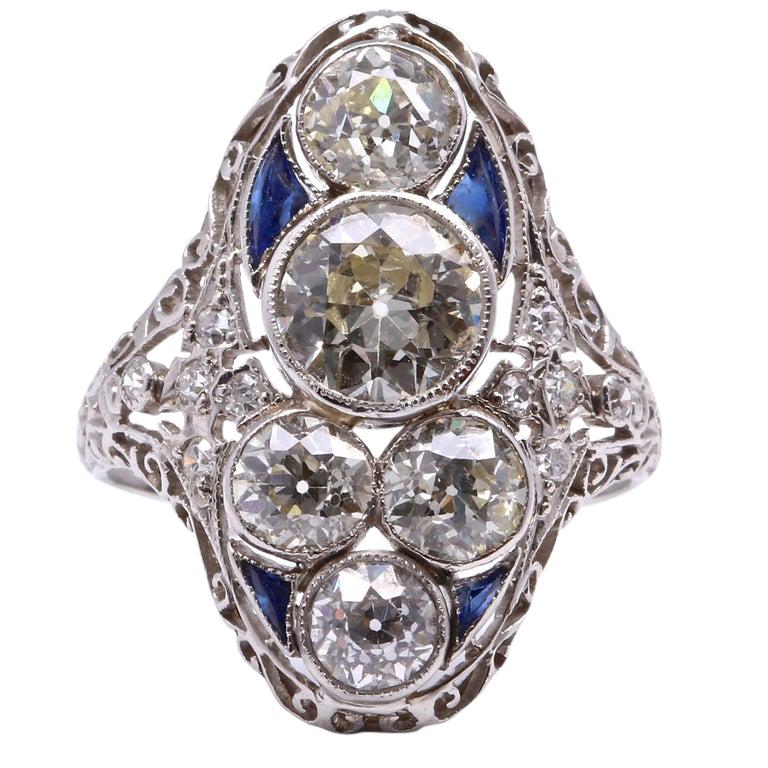 If you like jewelry from the Victorian era we think this ring will please you. True to its period, recognizably Victorian well made and featuring a 1.30 carat old European cut diamond surrounded by numerous old European cuts weighing approximately