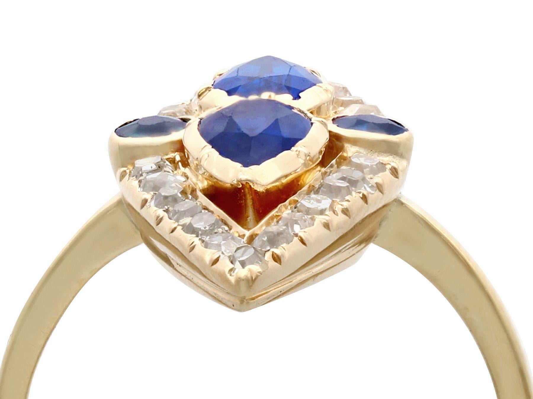 A stunning Victorian 1.35 carat blue sapphire and 1.32 carat diamond, 15 karat yellow gold marquise ring; part of our diverse antique jewelry collections.

This stunning, fine and impressive sapphire and diamond ring has been crafted in 15k yellow