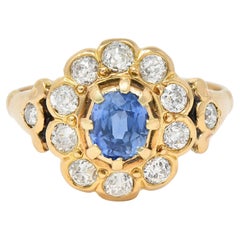 Victorian 1.37 CTW Sapphire Diamond 14 Karat Yellow Gold Antique Halo Ring