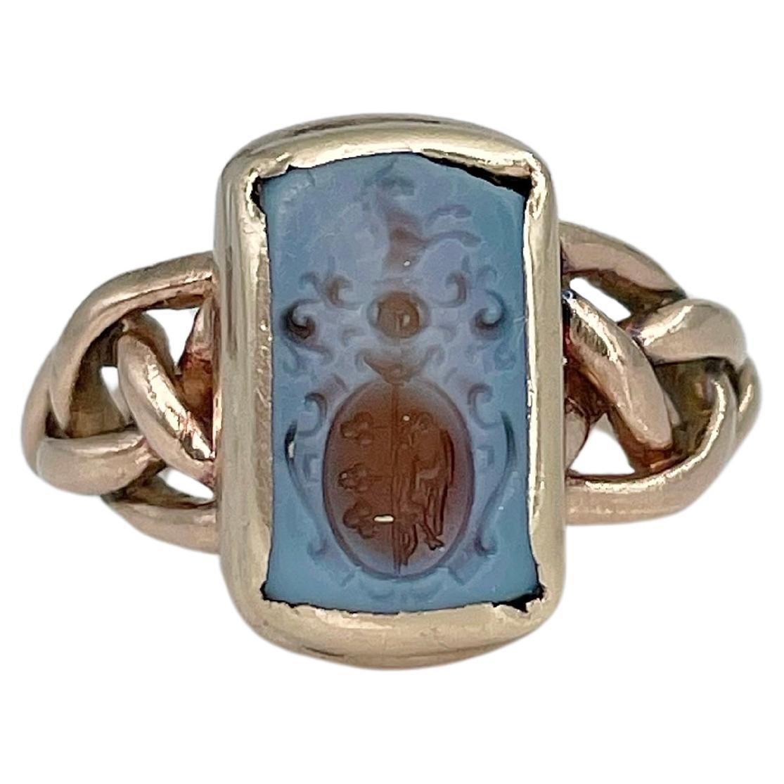 Victorian 9 Karat Gold Chalcedony Intaglio Heraldic Signet Ring For Sale