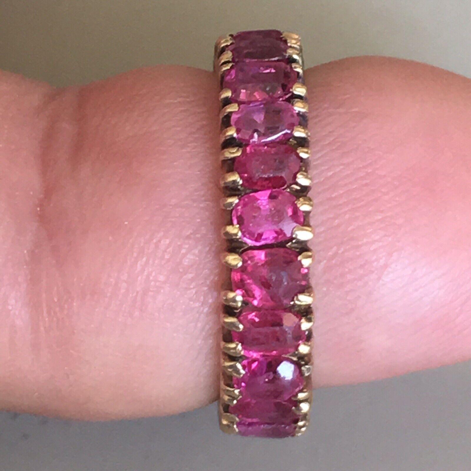 14 Karat yellow gold 4.5 mm wide eternity band finger size 6 weighting 3.1 gram, 

22 pieces of 4 mm by 3 mm Old Cushion Cut Natural Burmese Rubies in excellent condition, most likely unheated 

Victorian era, Circa 1880s 
American made

Authentic