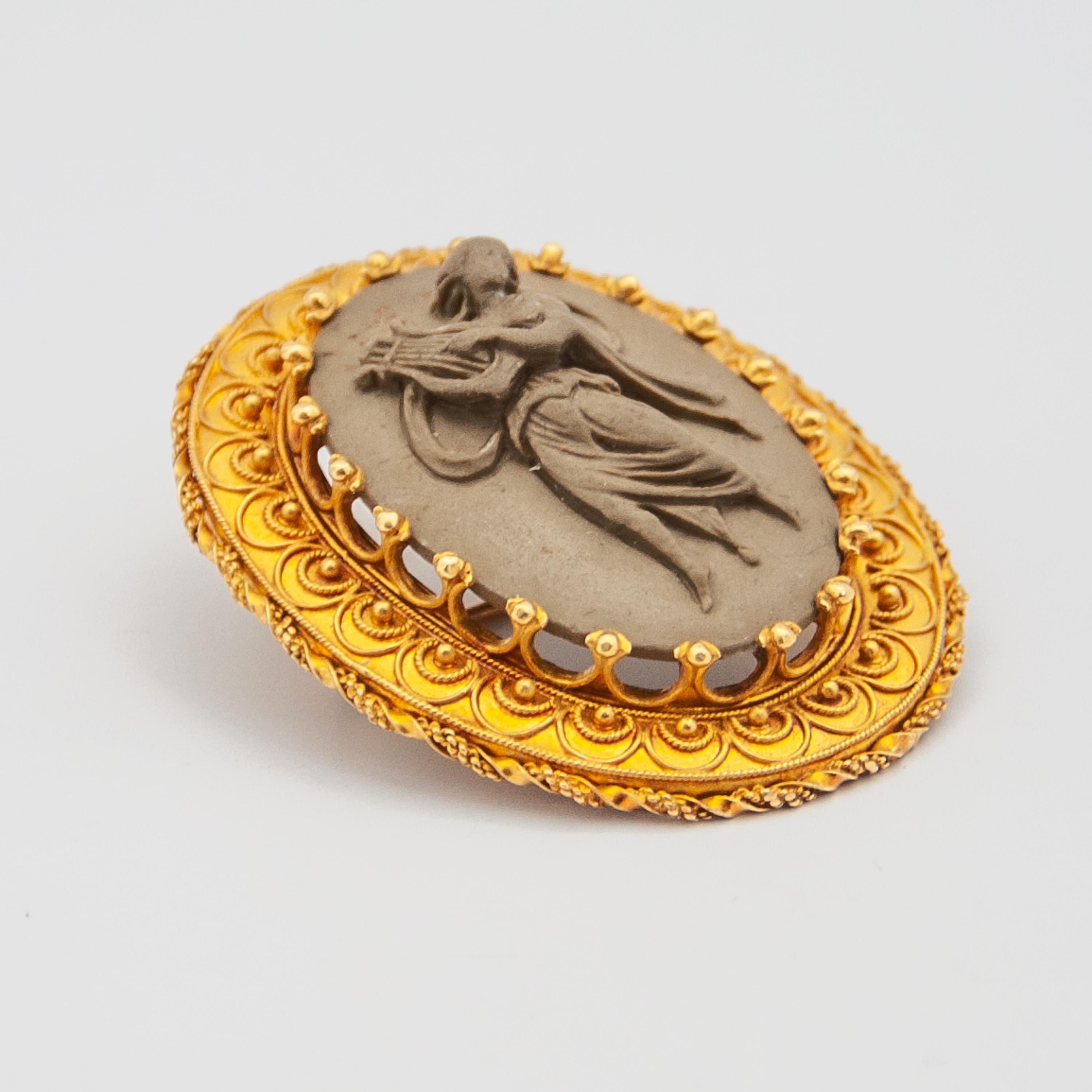 Victorian Antique 14K Yellow Gold Lava Cameo Brooch For Sale
