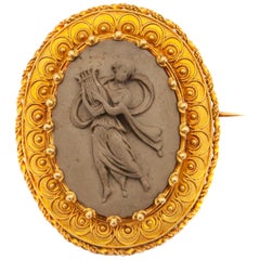 Antiguo broche victoriano de oro amarillo de 14 quilates con camafeo de lava