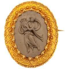 Broche ancienne en or jaune 14K, camée en lave