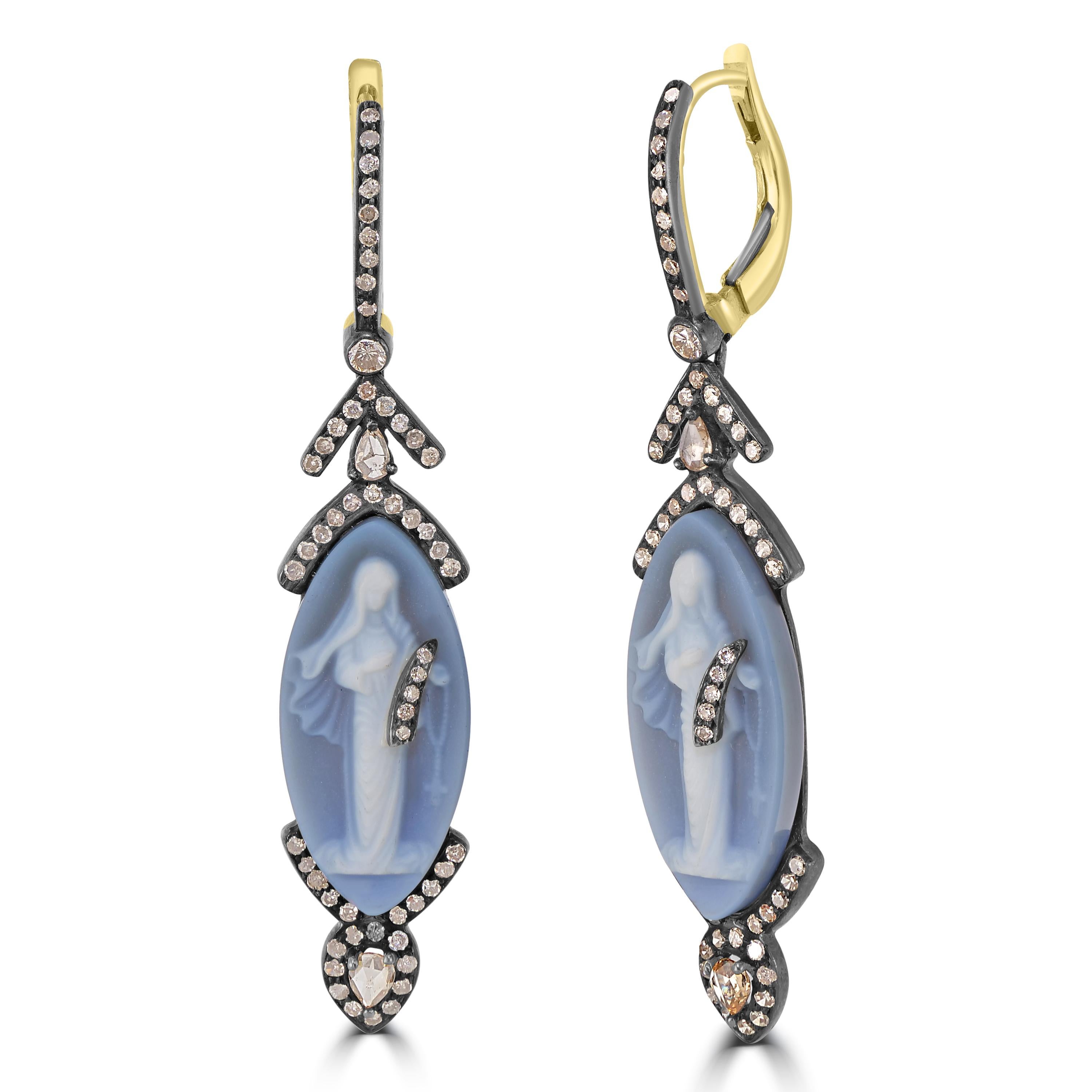 Introducing the Victorian 14.1 Cttw. Grey Cameo and Diamond Marquise Drop Dangle Earrings—a captivating blend of vintage charm and contemporary elegance.

These exquisite earrings feature a marquise drop adorned with a regal crown on both ends,