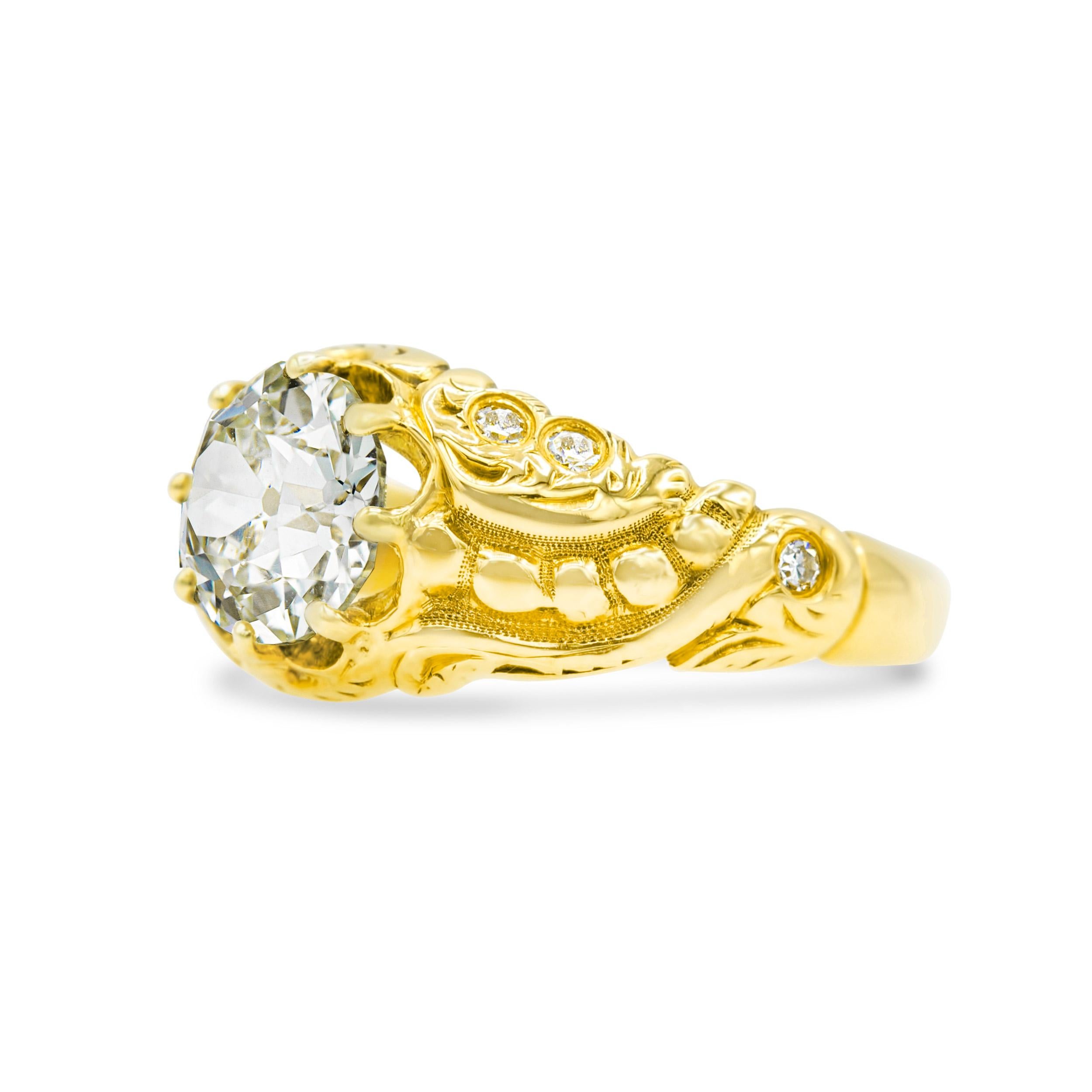 Yellow gold is definitely in style, and you'll be hard-pressed to find a prettier choice than this Victorian-era jewel. A 1.44 carat old European diamond sits at the center surrounded by a swirl motif and hand-engraved ring details. Why we love this
