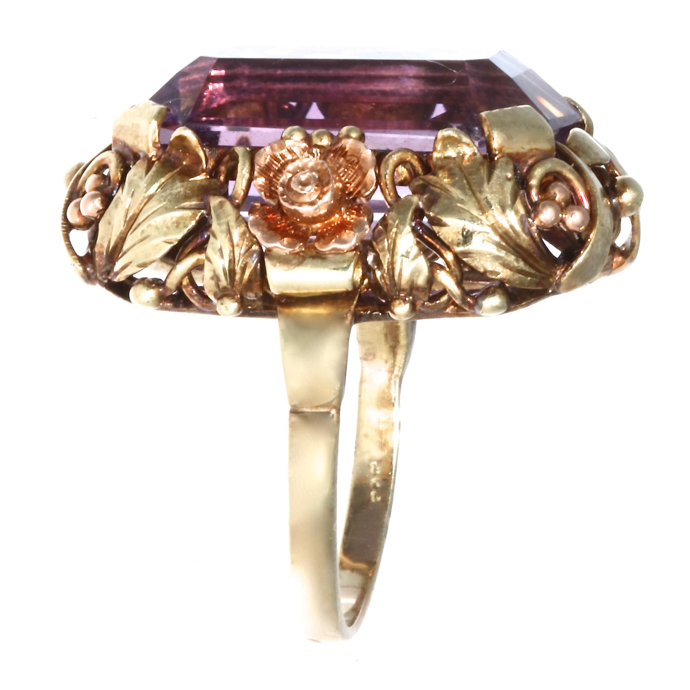 If you're a fan of the Victorian period this is a ring for you, it exemplifies the lace and frills of the era. The richly colored amethyst weighs approximately 14.75 carats created in 14k yellow and rose gold, size 7 and may easily be re-sized to