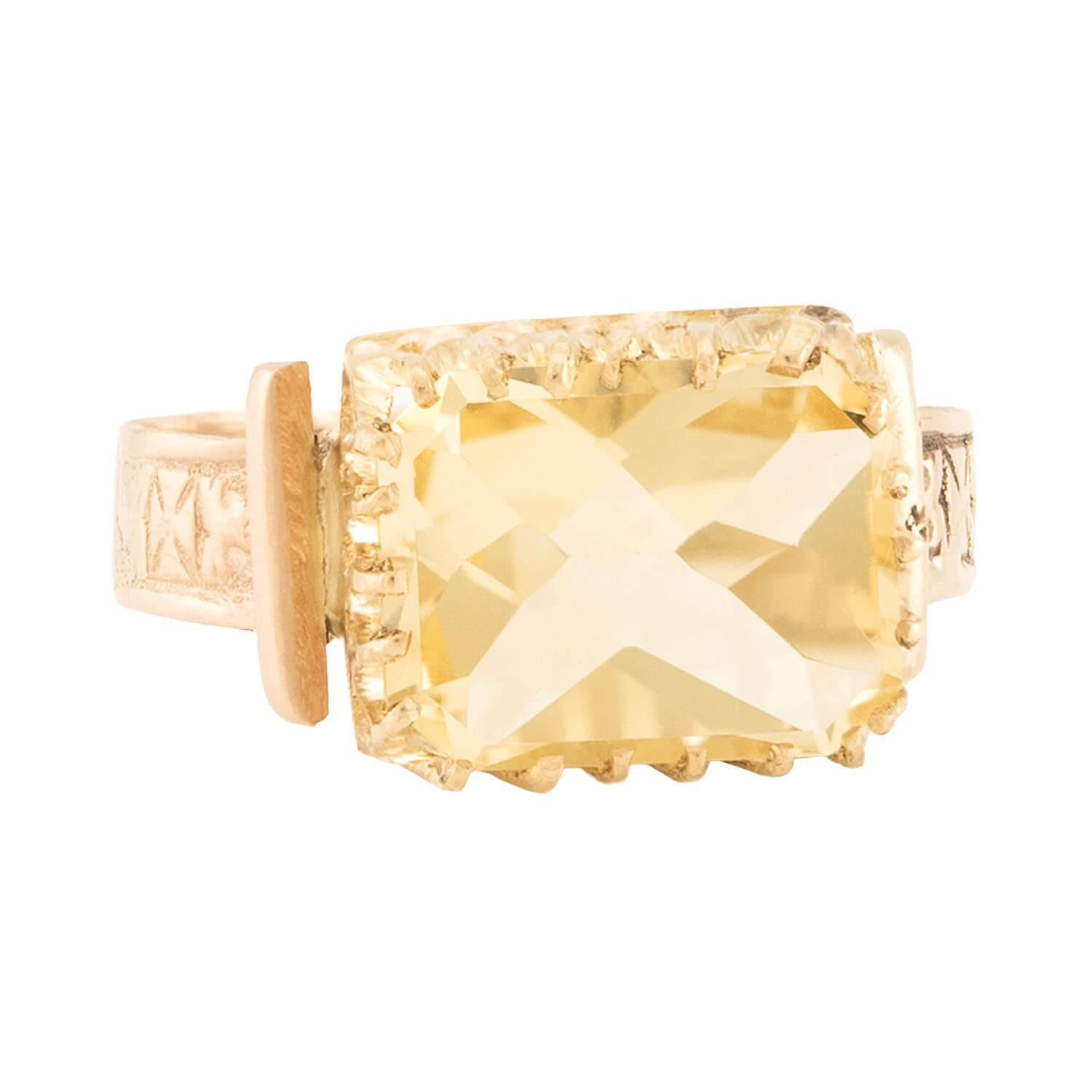 A simply beautiful citrine ring from the Victorian (ca1880s) era! Crafted in 14k yellow gold, this ring features a marvelous rectangular-cut citrine stone. The citrine is held within a multi-prong setting, and displays a lovely champagne hue, which