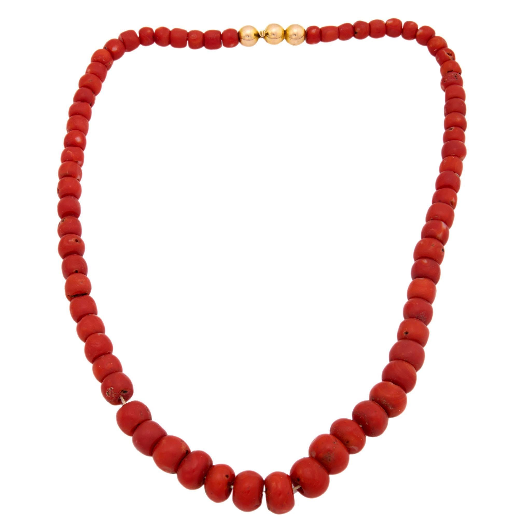 A simple yet beautiful beaded coral necklace from the Victorian (ca1880s) era! This lovely piece is comprised of a single strand of natural undyed coral beads, which are strung on white thread. The beads vary slightly in shape and color, but are all