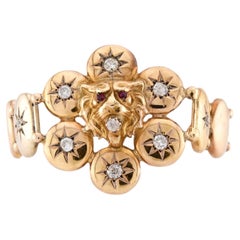 Pulsera Victoriana de 14 quilates con botón de león de diamante y rubí