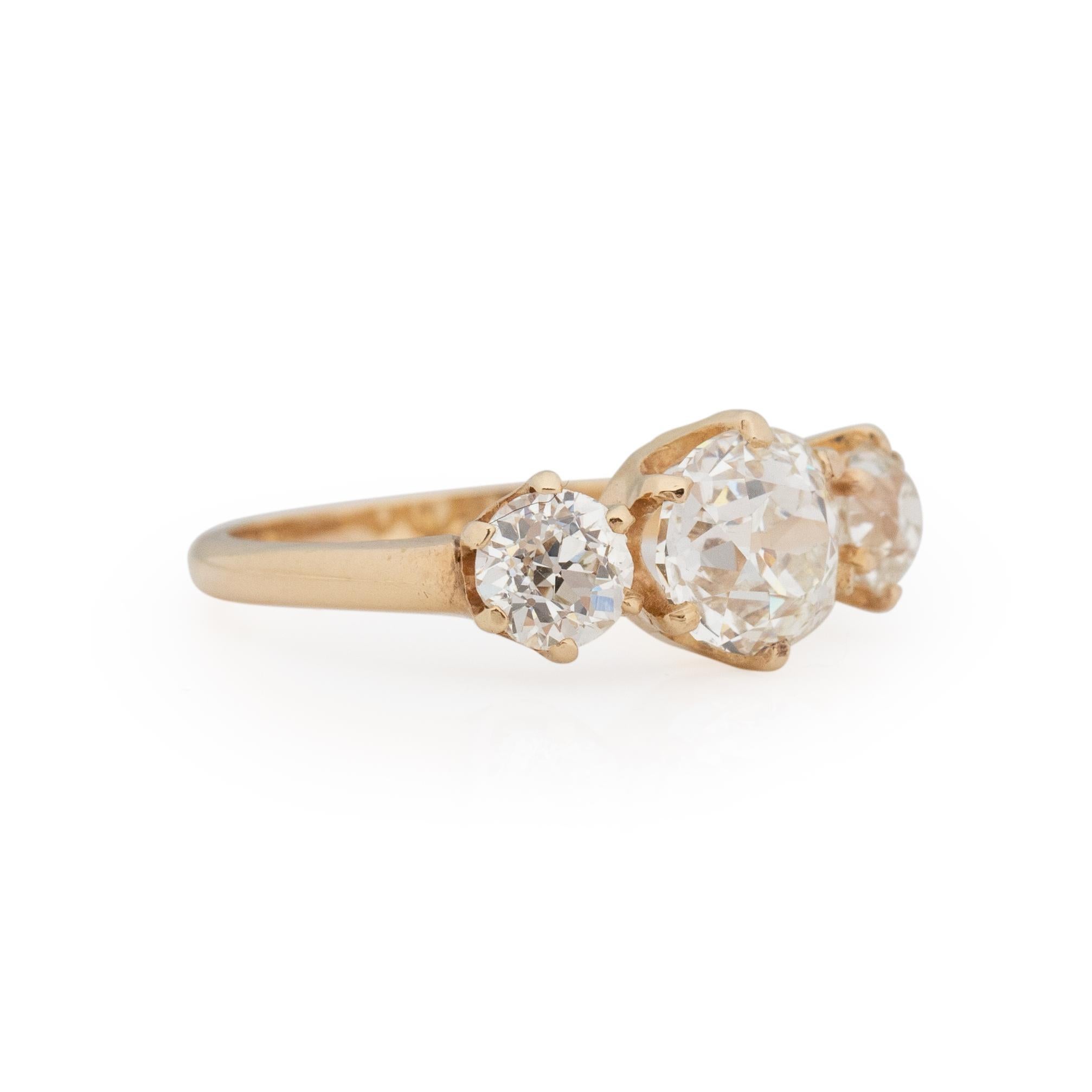 This three stone Victorian engagement ring is OUTSTANDING! Everything about this piece works flawlessly together to give a breathtaking, eye catching piece. Crafted in 14K yellow gold this strait shanked design is perfect in holding up three large