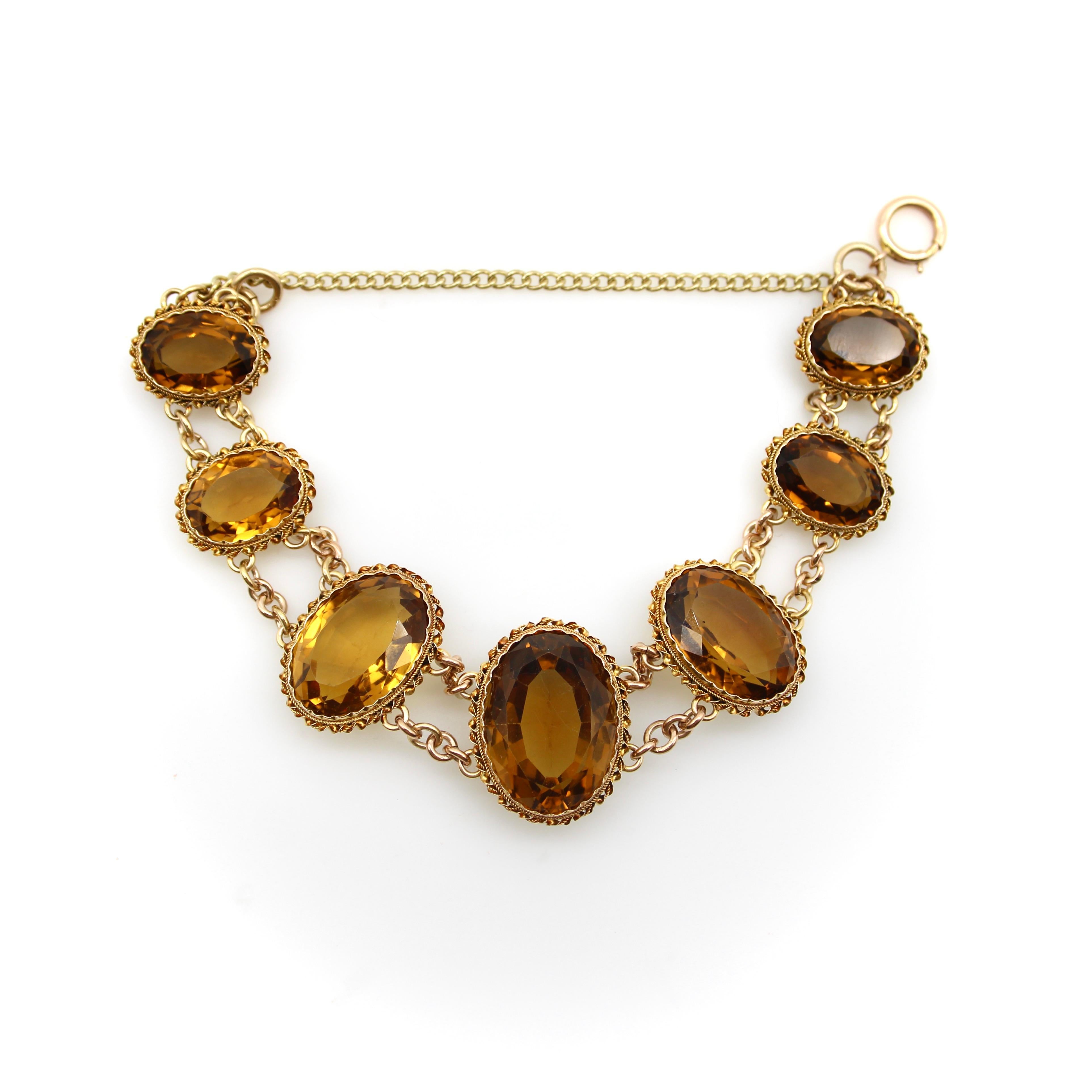What makes this Victorian 14k gold bracelet so beautiful are the magnificent, well-matched amber hued citrine gemstones that have stunning presence on the wrist. The stones graduate in size with the largest stone as the centerpiece, measuring 22 x