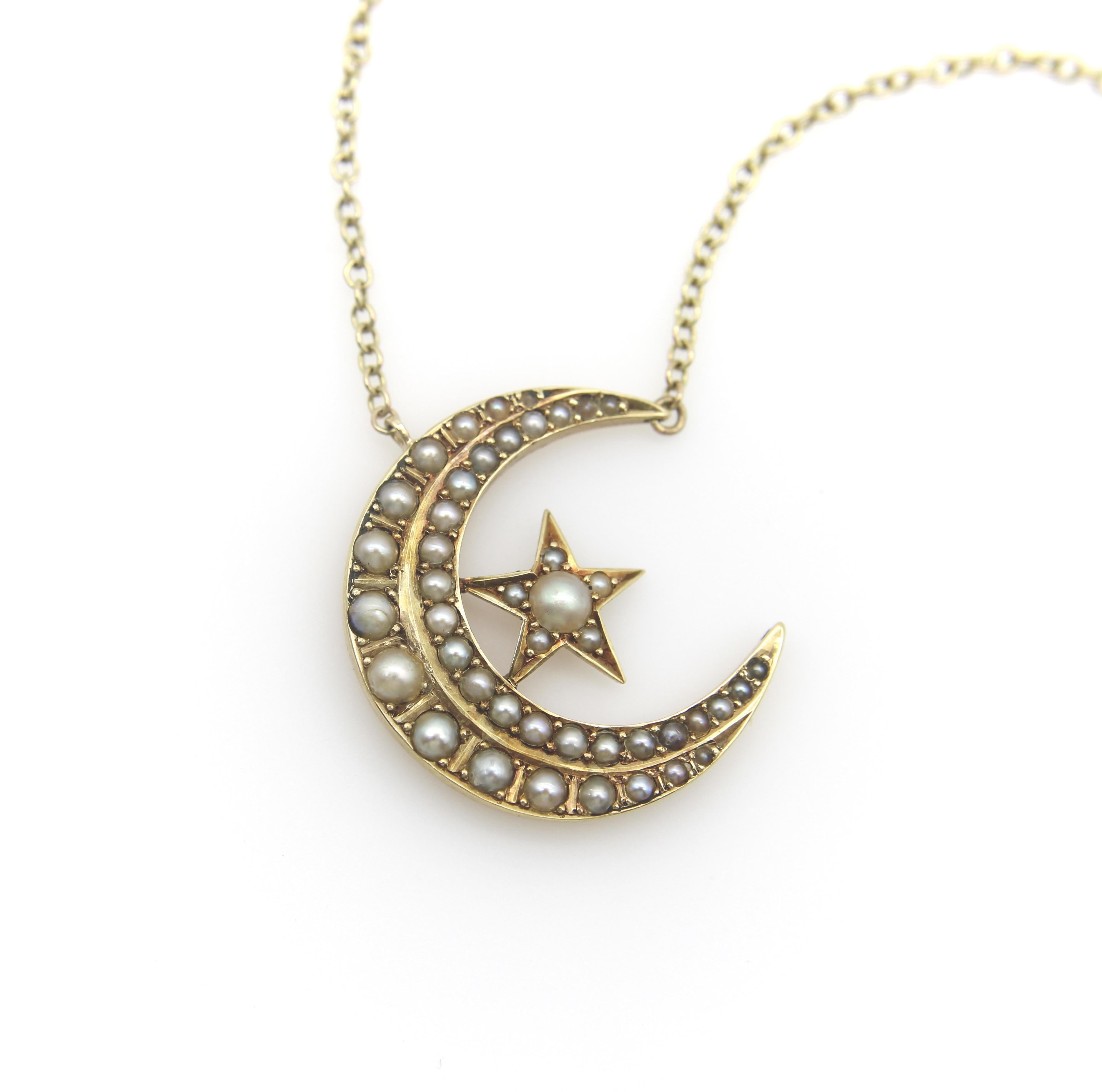 This 14k gold Victorian crescent moon pendant is beautifully studded with seed pearls and has a lovely star that balances in the center of the moon. The pearls graduate in size, with the biggest pearls toward the center and smaller pearls filling in