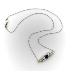 Collana vittoriana con pendente a forma di occhio in oro 14 carati con diamanti e zaffiri