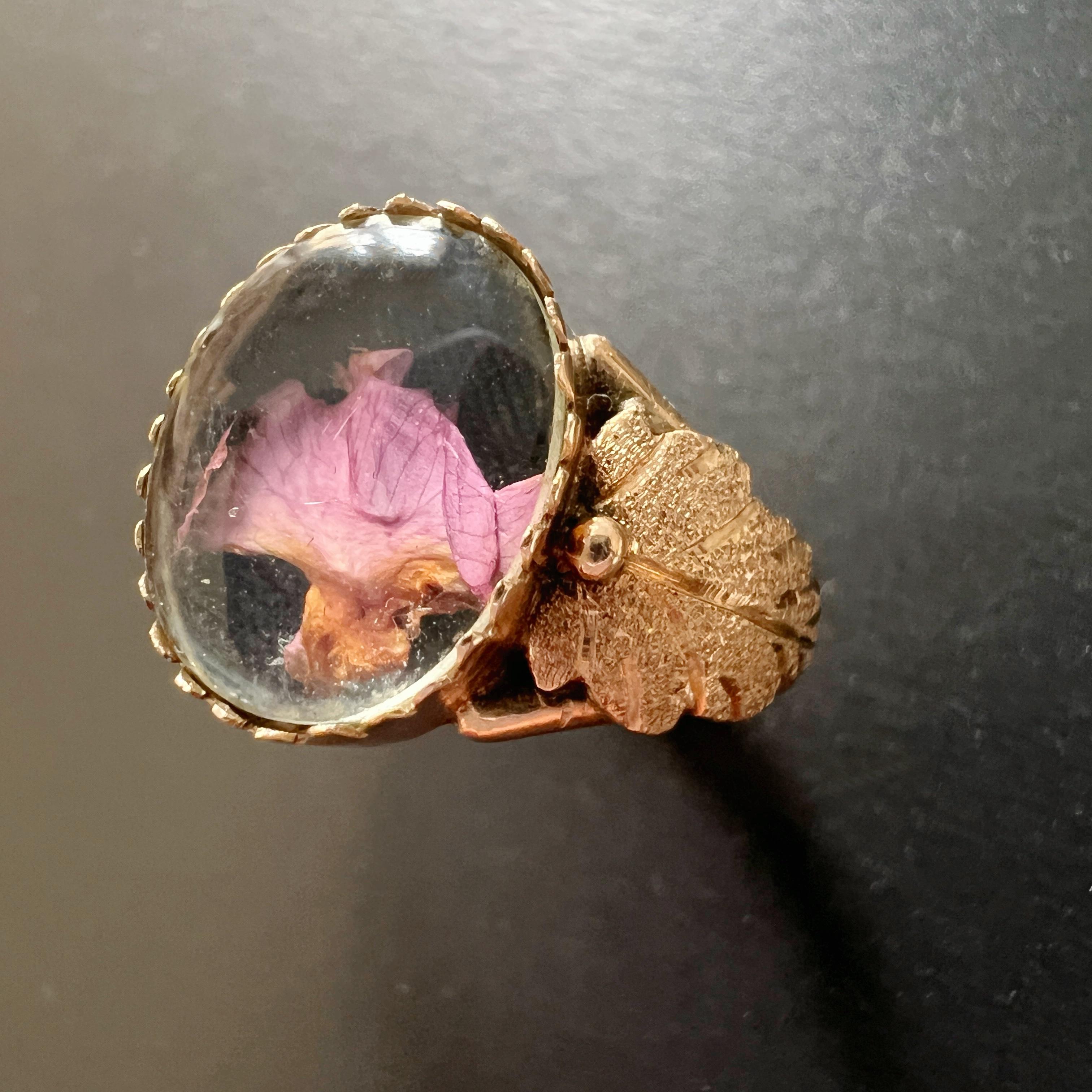 For sale a lovely 14K gold secret box ring all in its original condition. The ring features a little box container on the ring’s head, which can be open and close with the help of a little playdoh (please see the video). 

The box opens and closes
