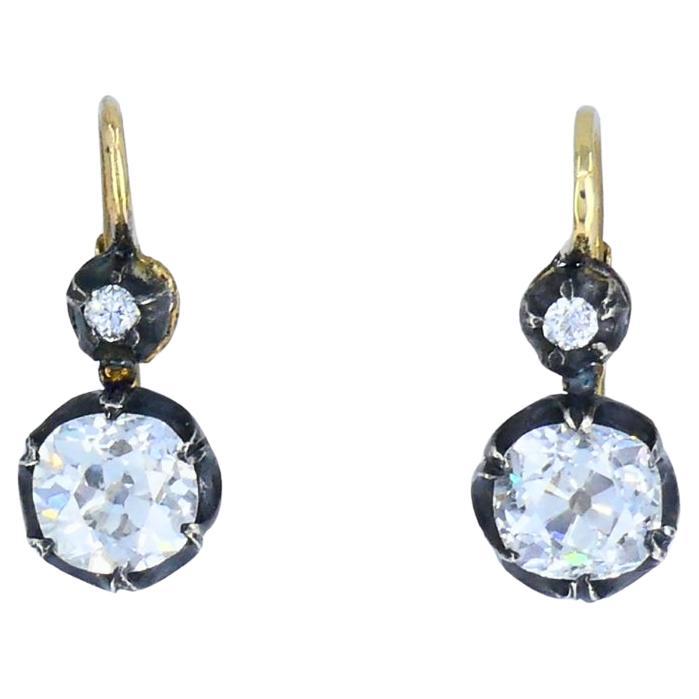 Orecchini vittoriani in oro 14k e argento a due pietre con diamanti Old Mine Cut, antico in vendita