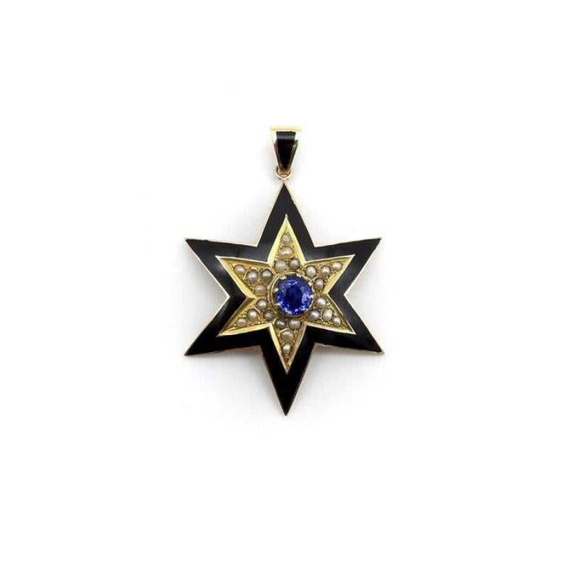 A very unique, handcrafted piece of a Victorian era jewelry, this star pendant features black enamel with pearls and a 1 carat sapphire stone as its centerpiece. This is a one of a kind piece of jewelry, and very unusual for celestial jewelry.  The