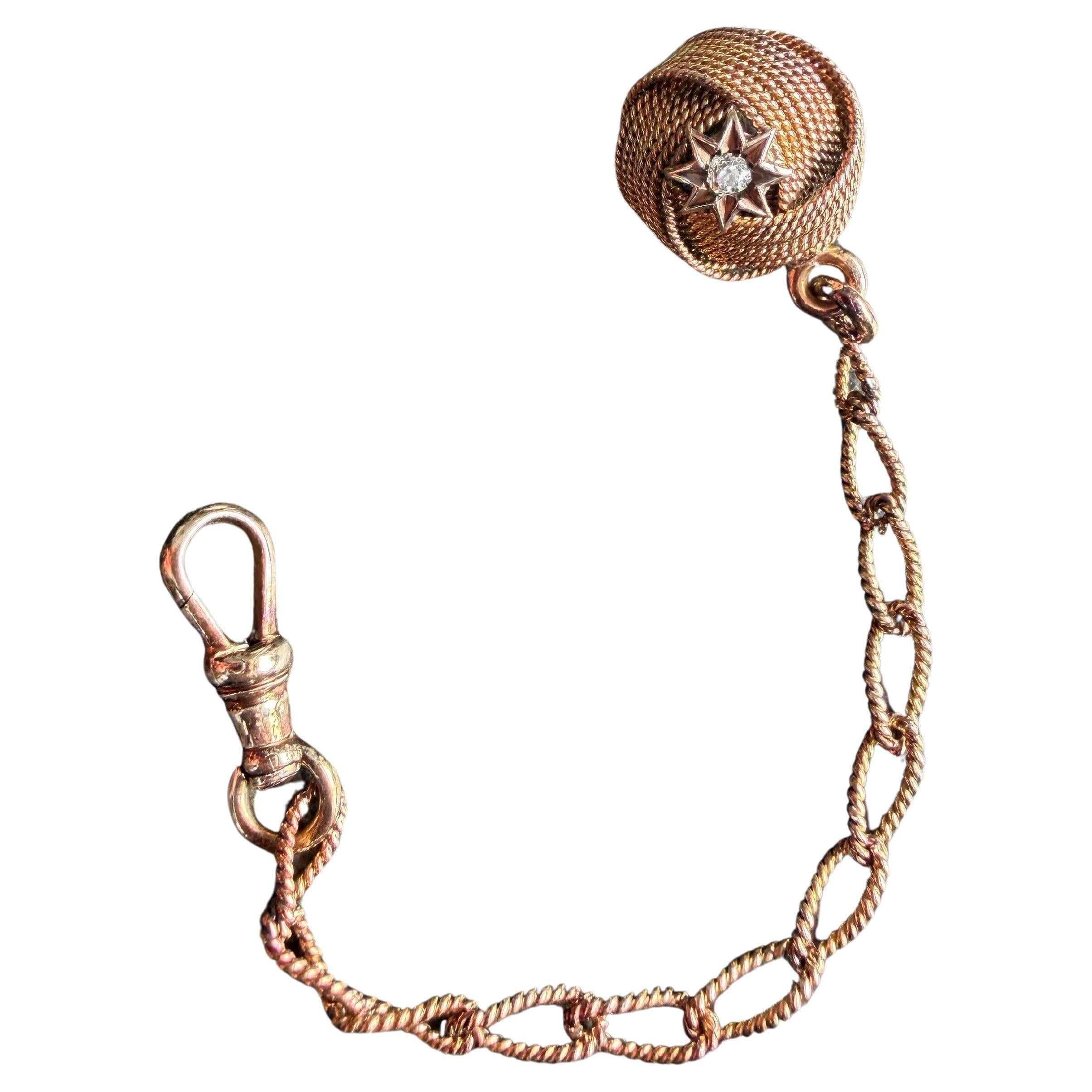 Cadena de reloj victoriana de oro de 14 quilates con detalles de diamantes, circa 1900 en venta