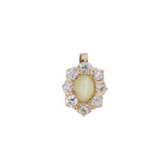 Pendentif victorien en or 14 carats avec saphir jaune étoilé et halo de diamants taille vieille Europe