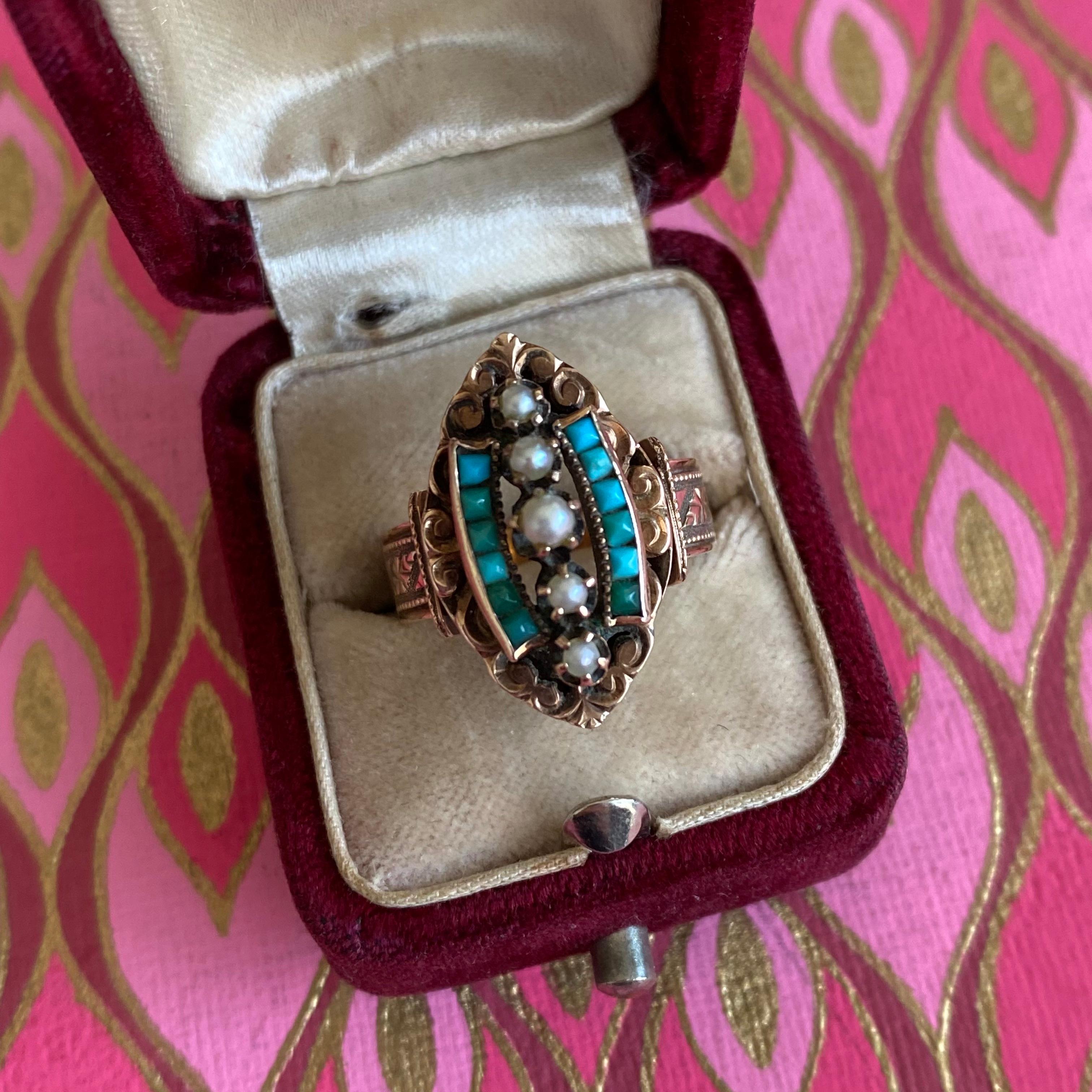 Details:
Absolutely stunning Victorian ring believed to be American made circa 1895. A very beautiful ring with 14K rose gold with 5 prong set seed pearls, and calibre cut turquoise. This piece is unique, and really not to be missed! The band