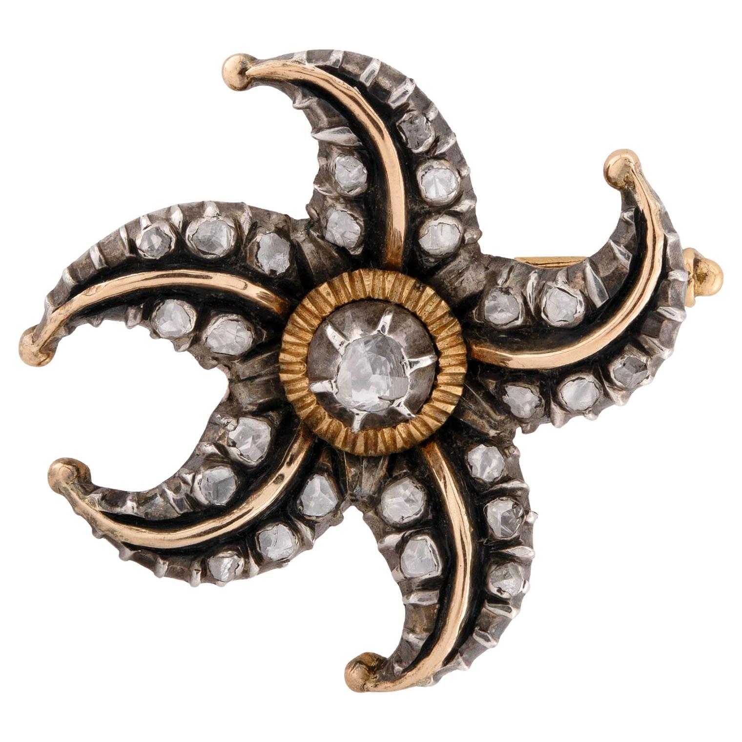Alfiler victoriano de estrella de mar con diamantes en plata de 14 quilates y plata de ley