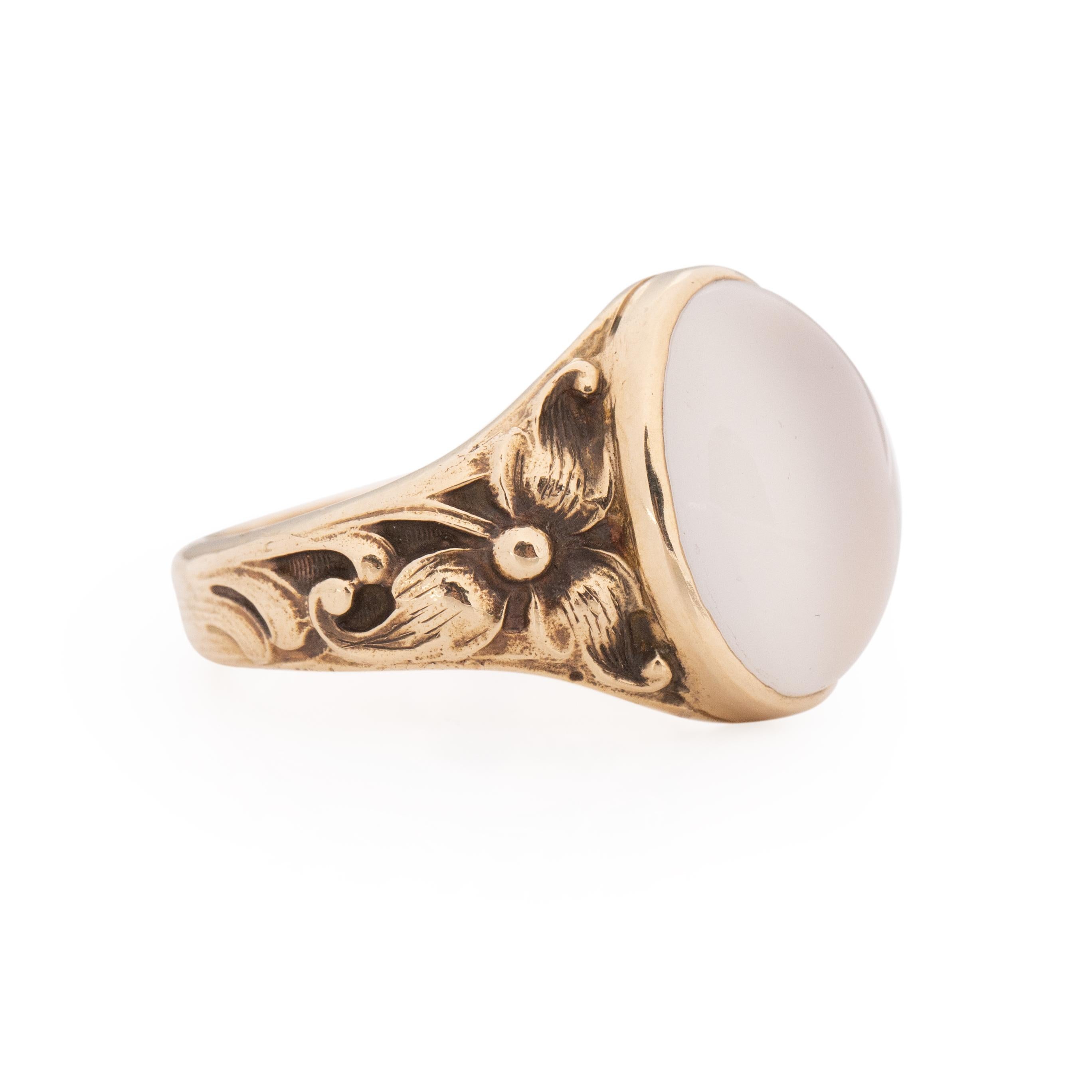 This Victorian beauty is a true one of a kind piece. Crafted in 14K yellow gold along the shanks are two detailed flowers that are reminiscent of the Michigan state flower the Trillium, a elegant three pedaled white flower that is considered