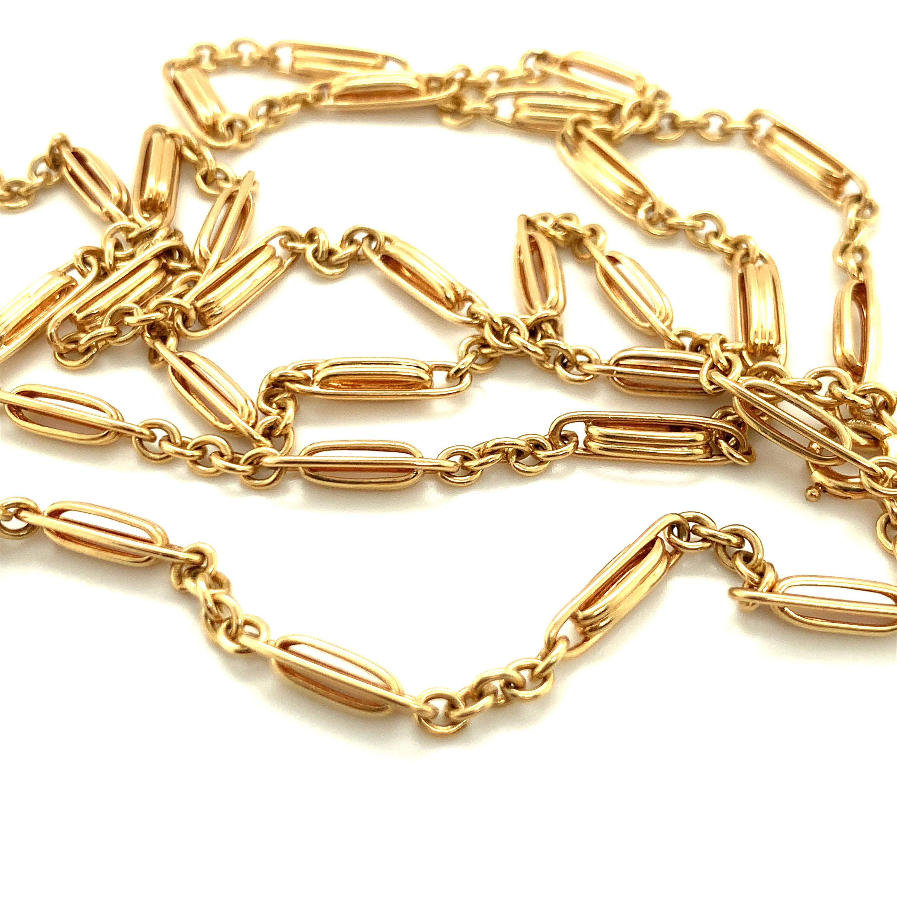 One 14K yellow gold Victorian fancy link antique chain necklace measuring 30 inches long and weighing 19 grams.  Measures 3 mm. wide.

Exquisite, intricate, distinctive.

Metal: 14K yellow gold
Circa: 1900, Victorian
Stamp/Hallmark: