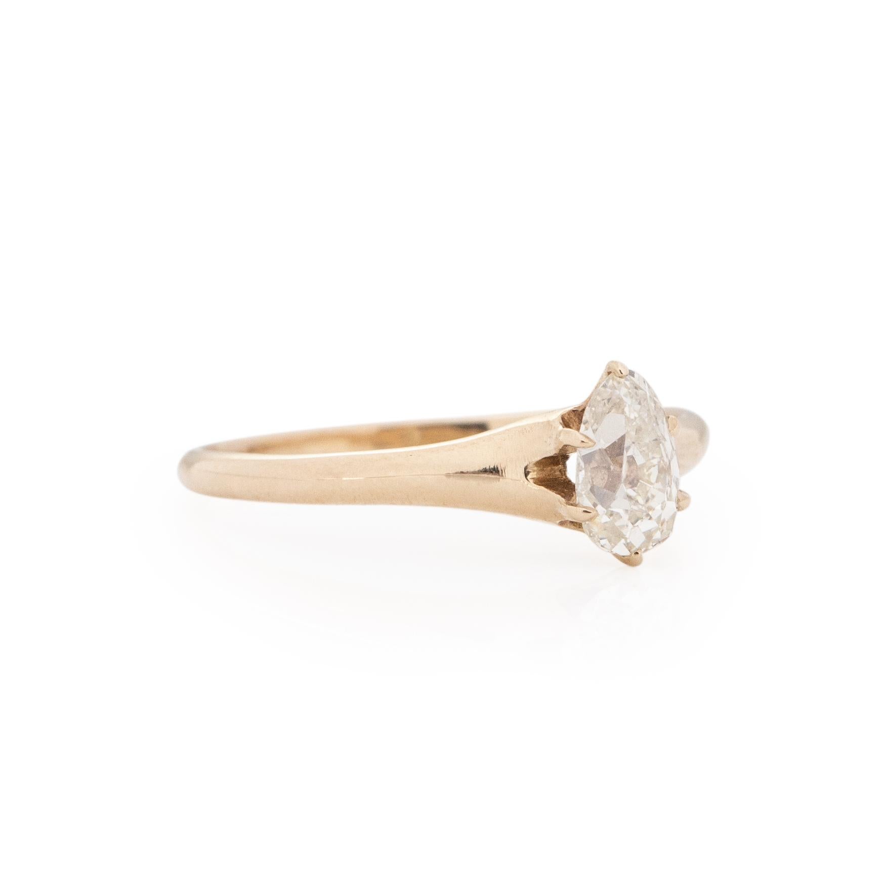This Victorian engagement ring is beautifully unique. The prong setting and 14K yellow gold is classic, the pear shape is what makes this piece one of a kind. A true beauty this ring can be pared with any vintage wedding band, help pop the question